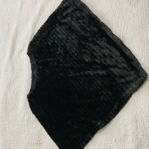 black fuzzy throw over